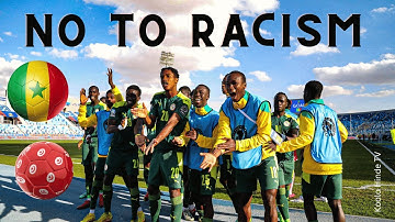 Senegal vs Tunisia: Walking towards the Tunisian fans and showing them the color of their skin.