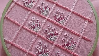 Hand embroidery of an embroidery pattern for table cloth,cushion cover or bed cover