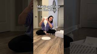 Making slime on the floor is a messy masterpiece. #slime #slimeasmr #asmr #floorslime #shorts