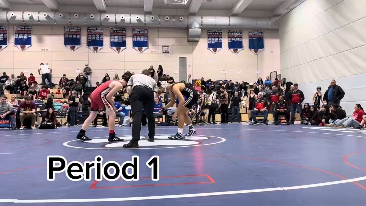 Jayden Freeman (Grade 12) VS. K-Town. First match of the season at 150LB