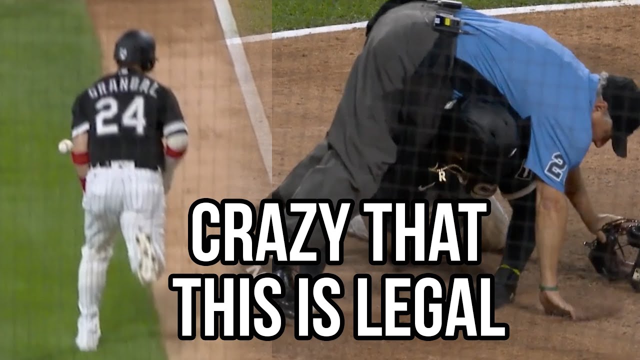 Grandal runs into the throw on purpose, a breakdown