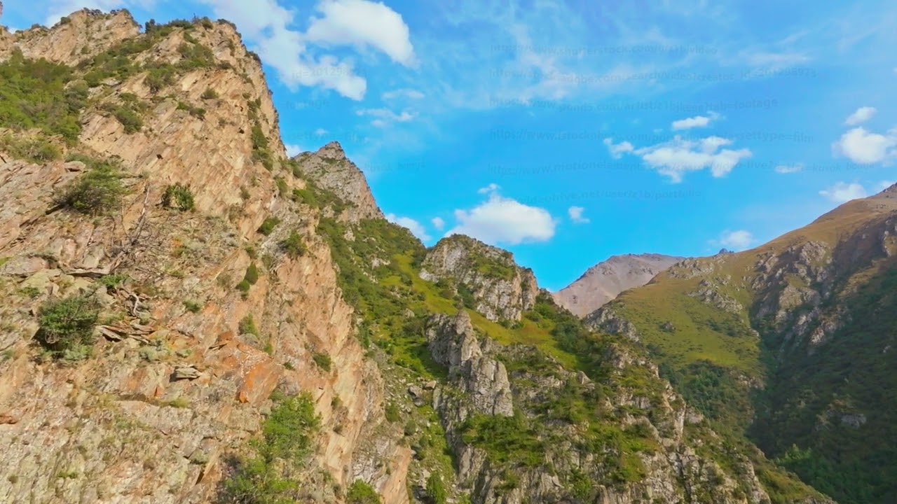 Drone Flight Near Rocky Mountain Cliffs in Kyrgyzstan