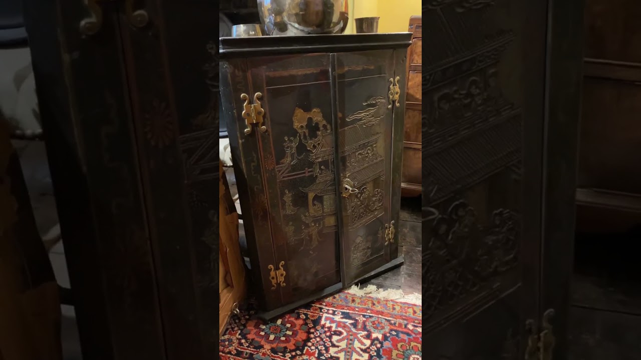 Early 18th century japanned double corner cabinet
