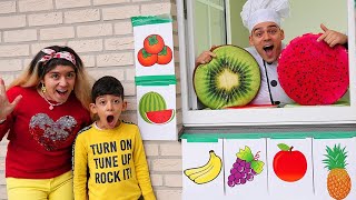 Jason and Alex Play in Fruit Drive Trough