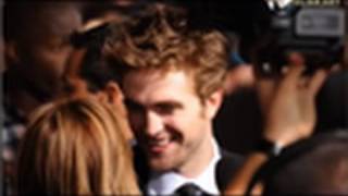 Kristen Stewart & Robert Pattinson arrive at Twilight New Moon LA Premiere