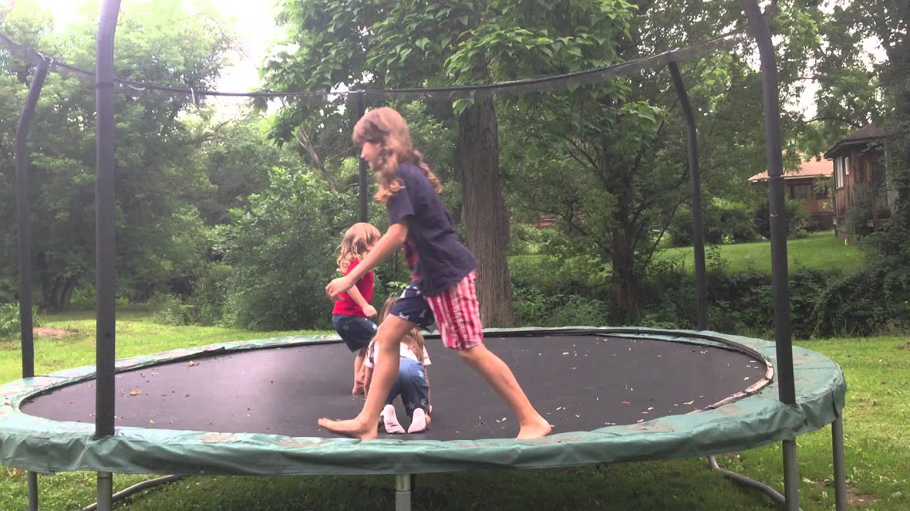 Boys jumping on grandpa's trampoline. - YouTube