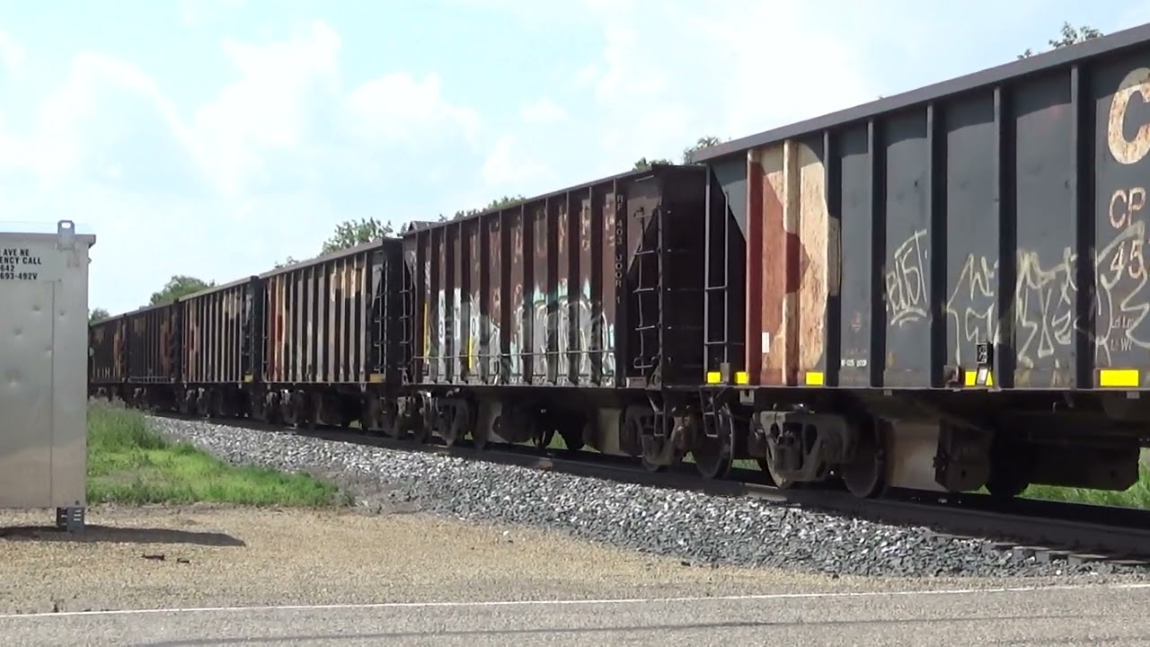 cp rail ballast train NB going by Arnold