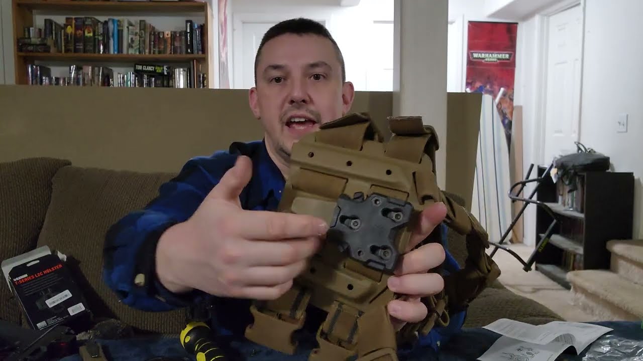 Putting a Blackhawk T series holster Drop Leg and Quick Disconnect together part 2.