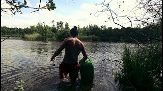 Swimming Alone with an Axe to a Tiny Island to Spend the Night.