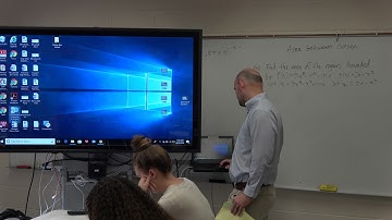 Find the area enclosed by the two curves using two integrals