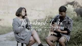 Download Lagu Terimakasih Luka - Dewi Purnama X Fuji (Official Music Video) MP3