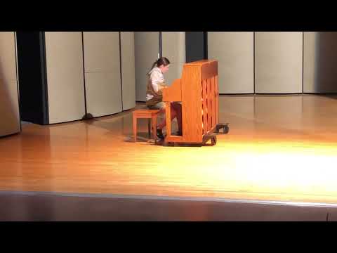 Girl from school plays rush e at talent show