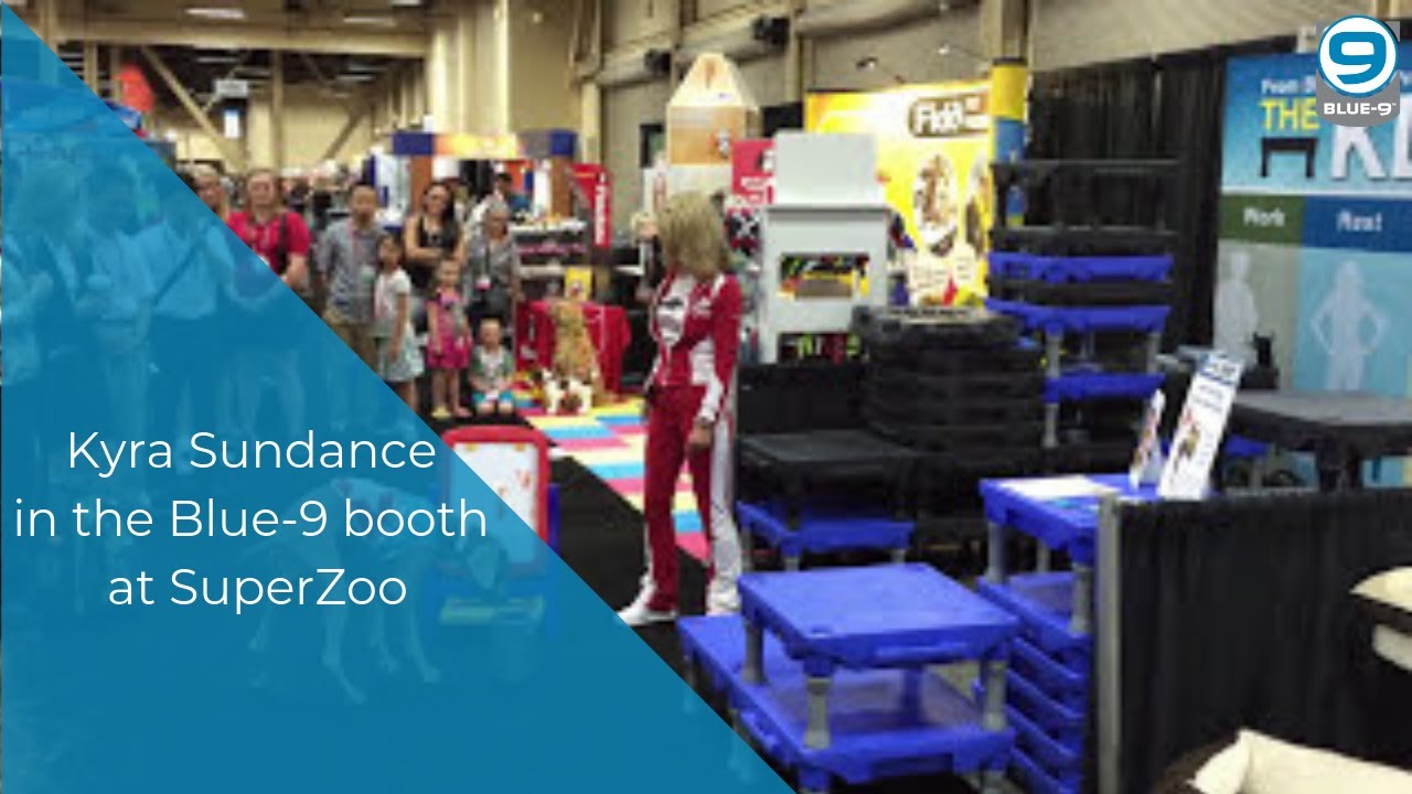 Kyra Sundance in the Blue-9 booth at SuperZoo