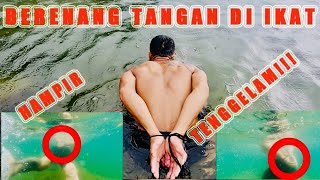 HANDS TIED, ALMOST DROWNED