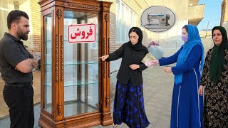 Fatima's efforts to buy a new sewing machine and Isa's opposition to her decision 