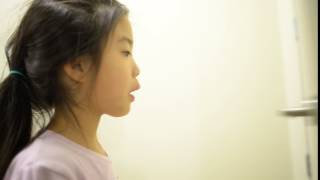 Removing Mia's wobbling tooth
