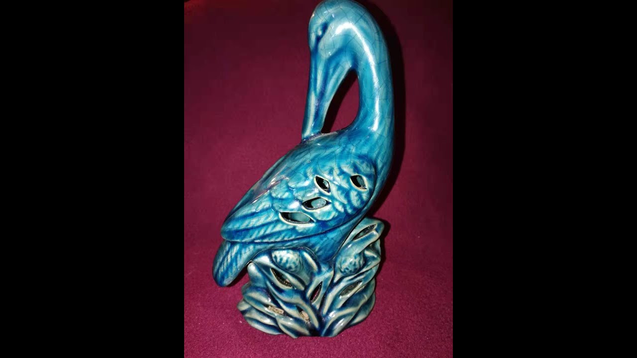 明宣德孔雀蓝釉镂空雕塑大鸟，A peacock blue glazed bird of Xuande