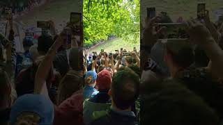 Competitors Participating in a Thrilling Cheese Rolling Race