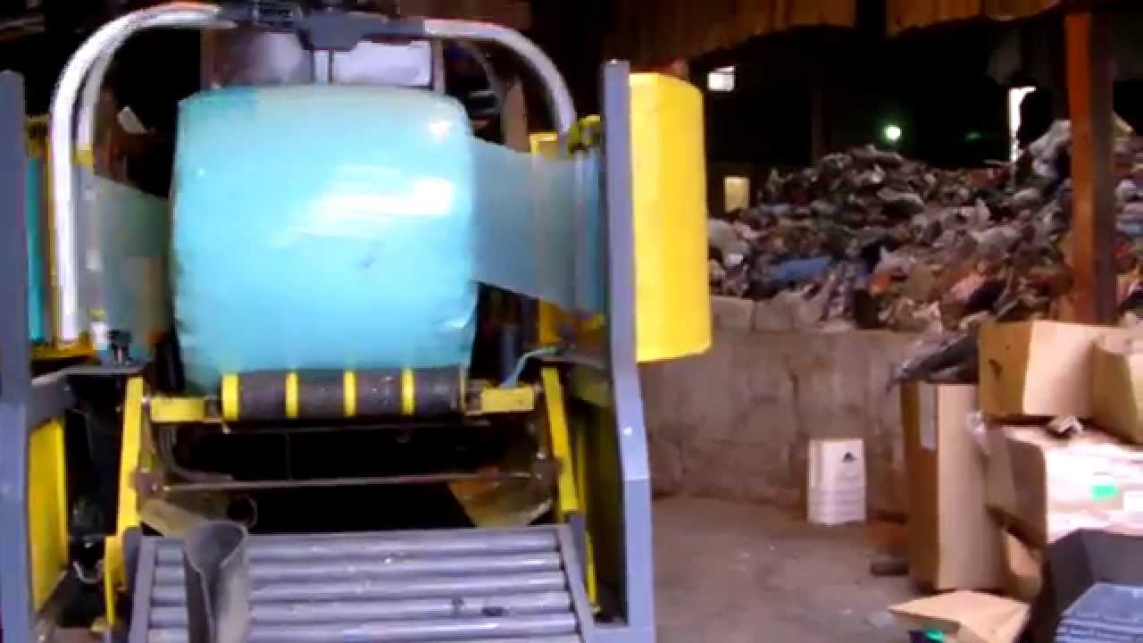 Big Round Baler Baling Unshredded MSW overs in Ireland