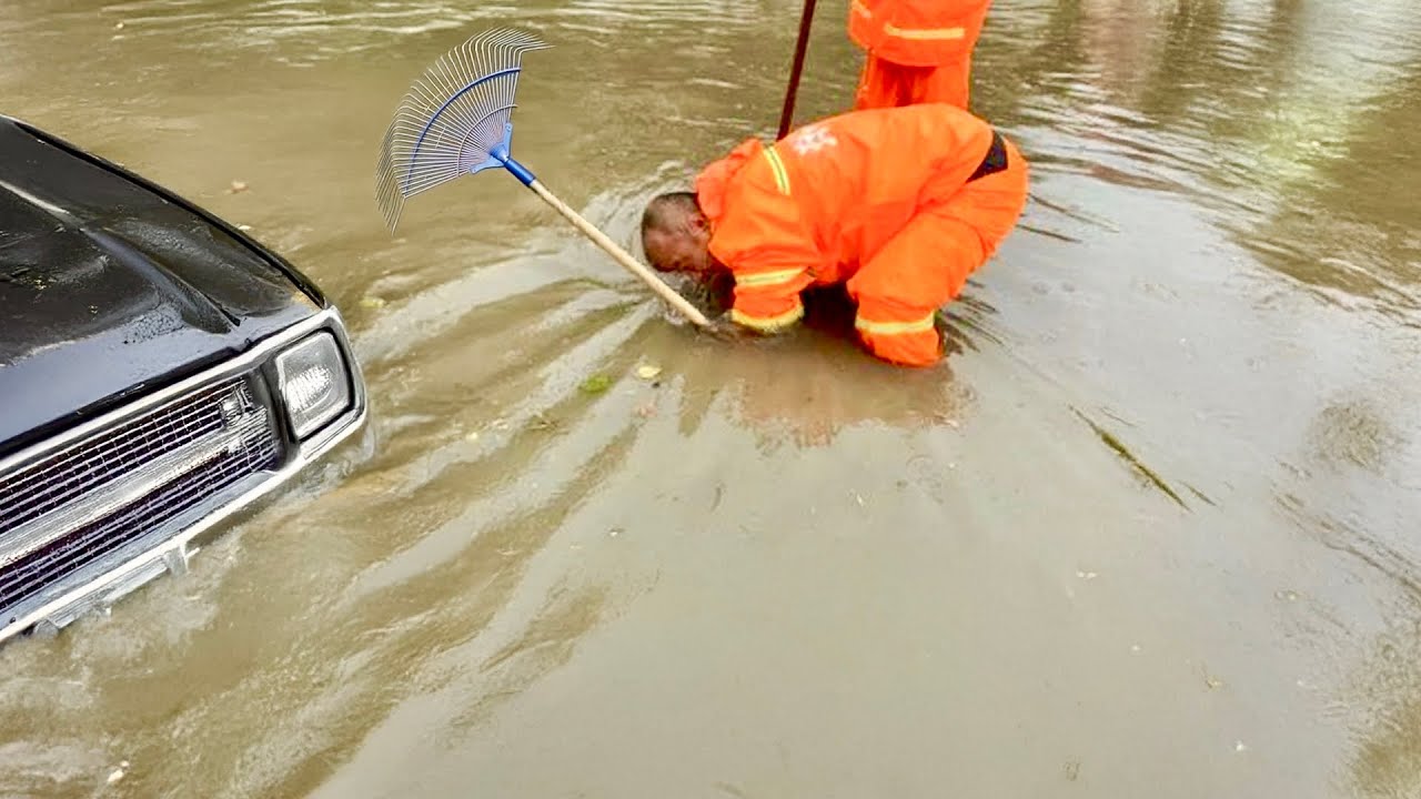 Flood Fighters Unclogging Storm Drains for Safer Streets! - YouTube