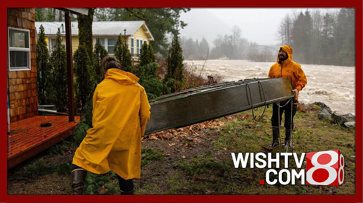 Record flooding threatens Washington as more heavy rain pounds the Northwest