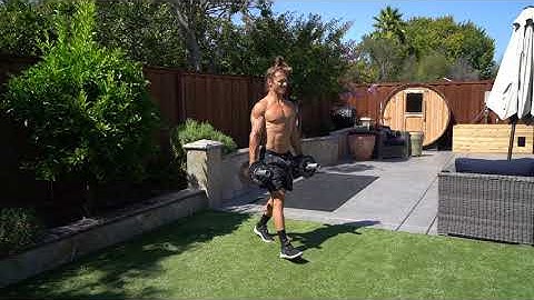 Dumbbell Suitcase Forward Lunge