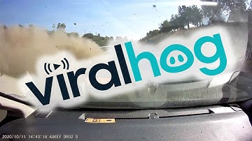 Overtaking Car Crashes into Barrier || ViralHog