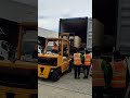 Forklift stuffing wooden crate into container #shorts #forklift #heavylift #container #heavylift