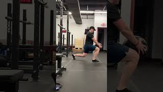 Split stance medball slam