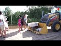 Wheel loader driver helps flooded community in Brazil | REUTERS