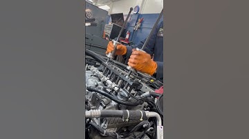 1.5 Chevy engine injectors removal with special tools.