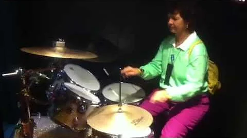 Deborah Mathieu playing the drums