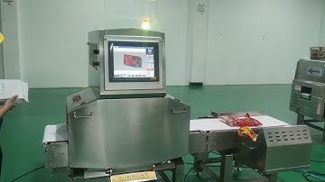 X-ray Inspection System With Swing Arm Rejection System.