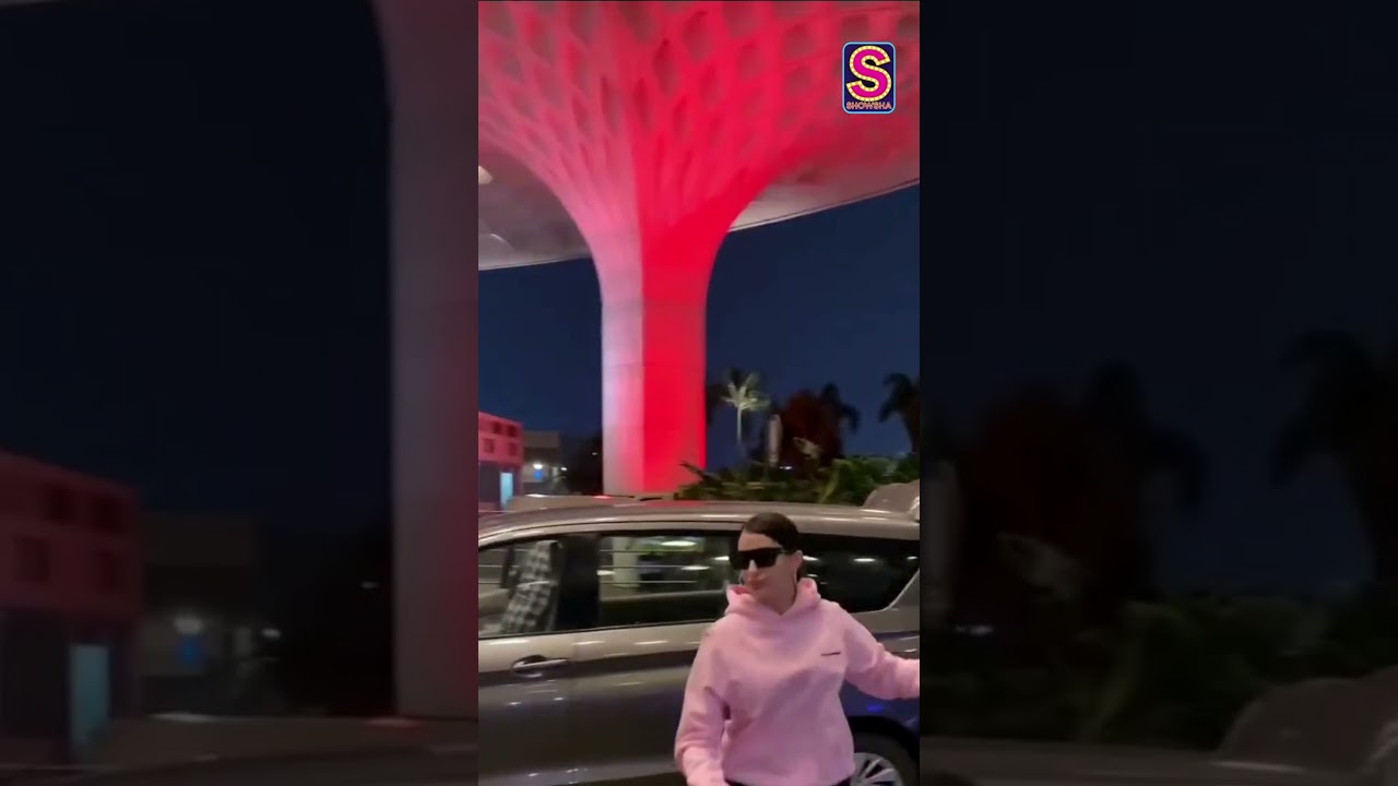 Nora Fatehi Spotted At Mumbai Airport In A Rush, Looks Pretty In A Pink Hoodie