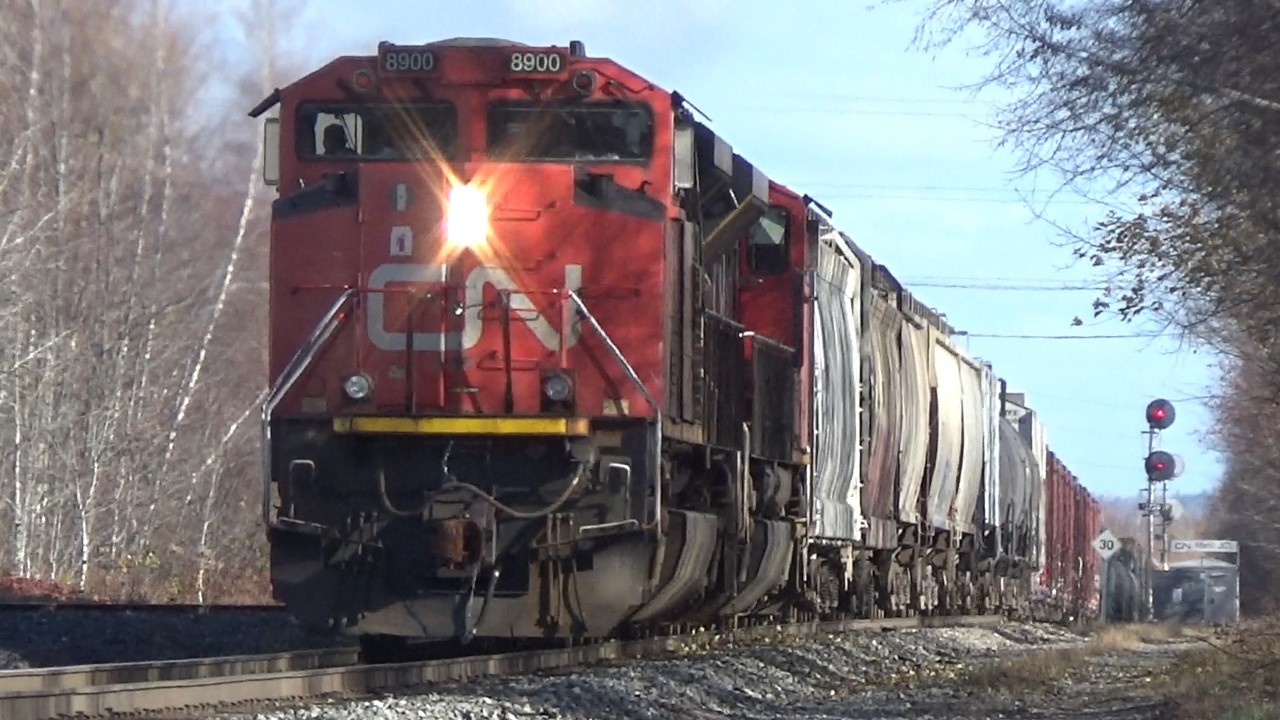Friendly Crew on a Decent Size Manifest Train CN 507 passing Marsh Junction West End of Moncton, NB