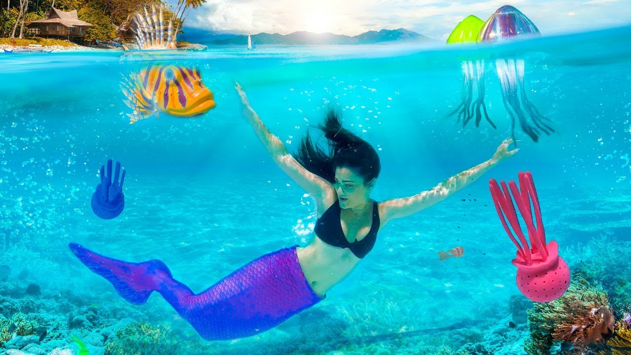 Mermaid Trying Crazy Pool Toys Underwater