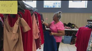 Local charity holds giveaway with clothes donated from Dillard's store closing