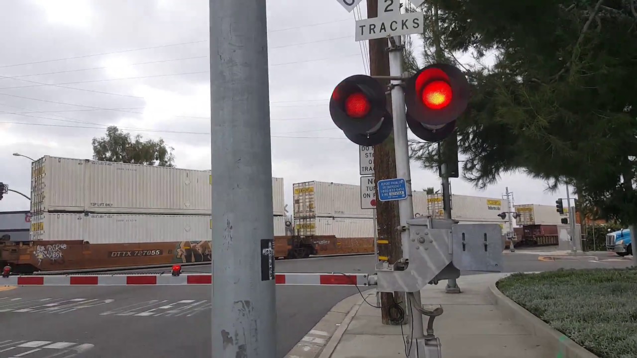 BNSF 7600 Intermodal crosses Rosecrans Ave/Marquardt Avenue (video3) Santa Fe Springs CA.