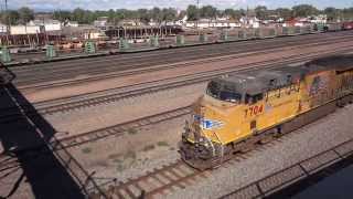 EBD Union Pacific Railroad #7704 mixed freight train barrels thru Laramie, WY @ track speed9/16/13