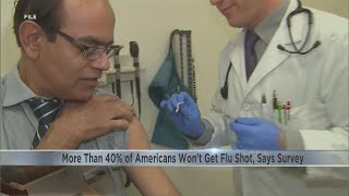US health experts urge flu shots to avoid 'twindemic'