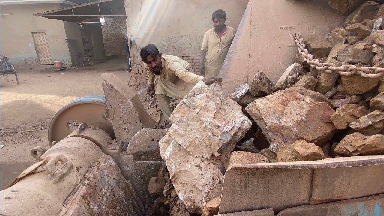 “Stone Crusher Machine: A Giant at Work “The Power of Stone:Machine Working in Action….