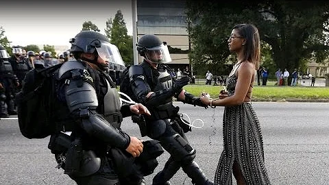 Woman in iconic Baton Rouge standoff photo breaks ...