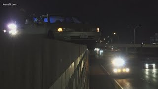 Woman's vehicle left hanging over highway after she says driver ran her off the road