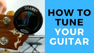 how to tune a guitar tutorial - beginner guitar lesson
