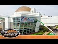 Perforated vinyl window graphics install  st louis science center  drone footage  adgraphix