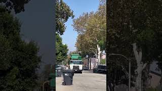 Wednesdays mean we get to see the green trash trucks! 🚛💨