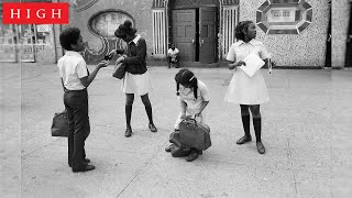 Four Children at Lenox Avenue, Harlem, NY by Dawoud Bey
Since the beginning of his career in the 1970s, Dawoud Bey (American, born 1953) has used his camera to create poignant meditations on visibility, race, place, and American history. Dawoud Bey: An American Project, on view now in the Wieland Pavilion Lower Level, traces these through lines across the forty-five years of Bey’s career and his profound engagement with the young Black subject and African American history.
In this short film, Mellon Undergraduate Curatorial Fellows, Kayla Gaskin (Emory University, Class of 2020) and Taylor Roberts (Oglethorpe University, Class of 2021) discuss Bey’s Four Children at Lenox Avenue, Harlem, NY. Dawoud Bey: An American Project is co-organized by the San Francisco Museum of Modern Art and the Whitney Museum of American Art, New York and is on view at the High through March 14, 2021.
Visit the High Museum: https://high.org/ Four Children at Lenox Avenue, Harlem, NY by Dawoud Bey