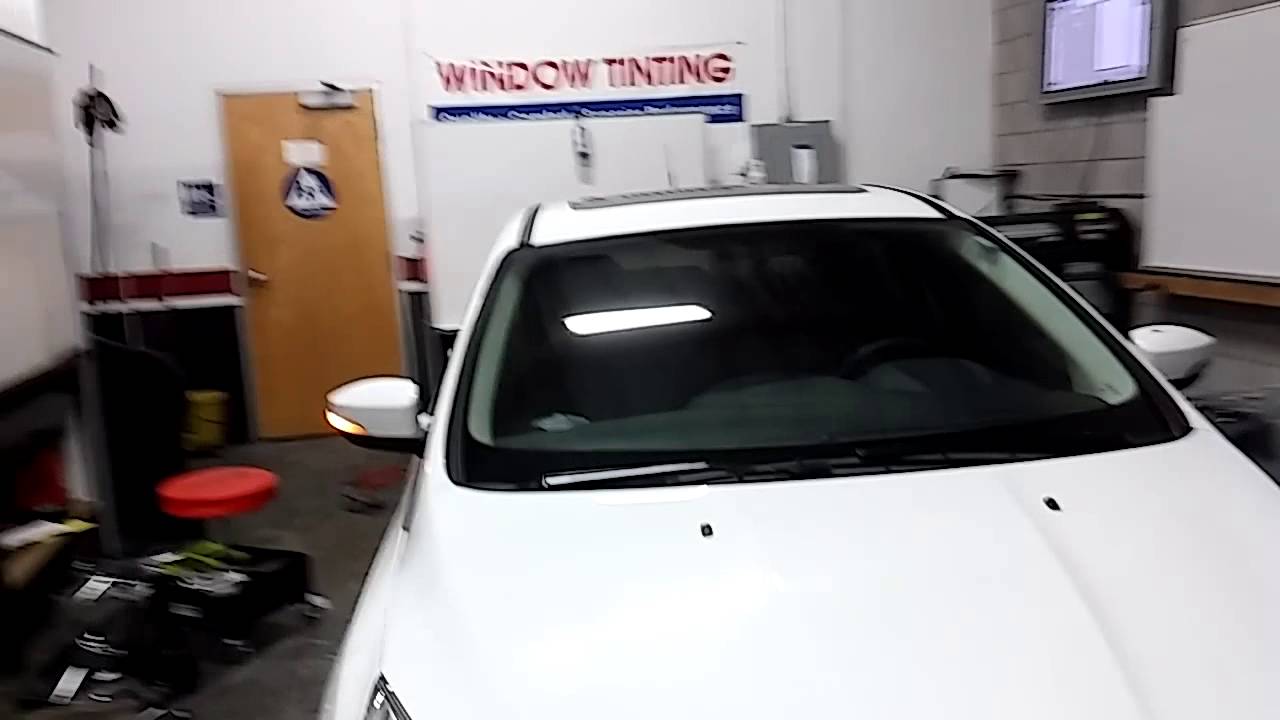 Window tint SUNTEK 18% carbon rear windows and 35% carbon 