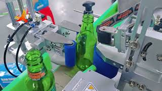 Automatic positioning round bottle labeling machine (double label head), for bottle neck and body