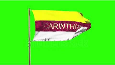 Carinthia flag with title waving in the wind. Looping sun rises style. Animation loop Stock video